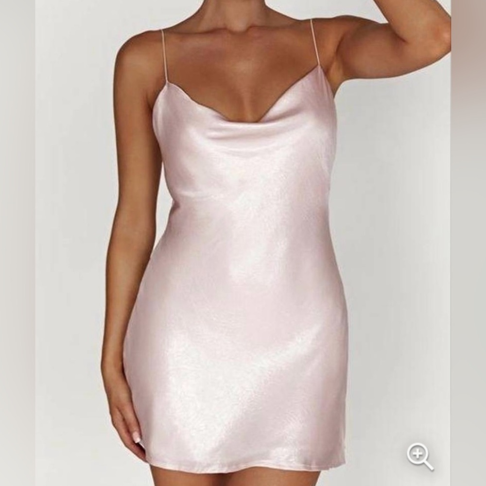 MESHKI: We love the RHEA Cowl Mini Dress for its ethereal vibe and flirty fit.